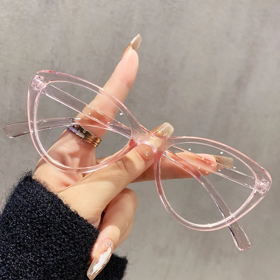 Single-piece glasses with cat-eye design, featuring a fashionable Y2K style, suitable for daily wear and street photography.