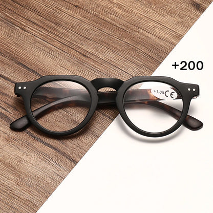 A retro classic black round frame leopard print leg fashion trend sunglasses, unisex, suitable for reading and browsing computer