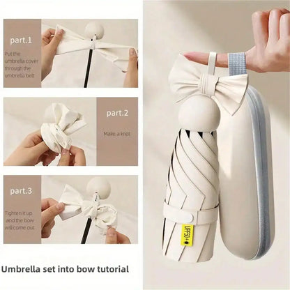 Compact black mini capsule umbrella - portable, foldable, manually open, with sun protection coating, durable design with